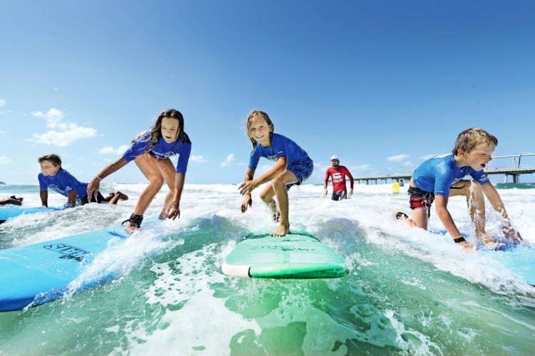 GetWet750x500(FILEmini)102kb AICOL Winter Camp students learning to surf